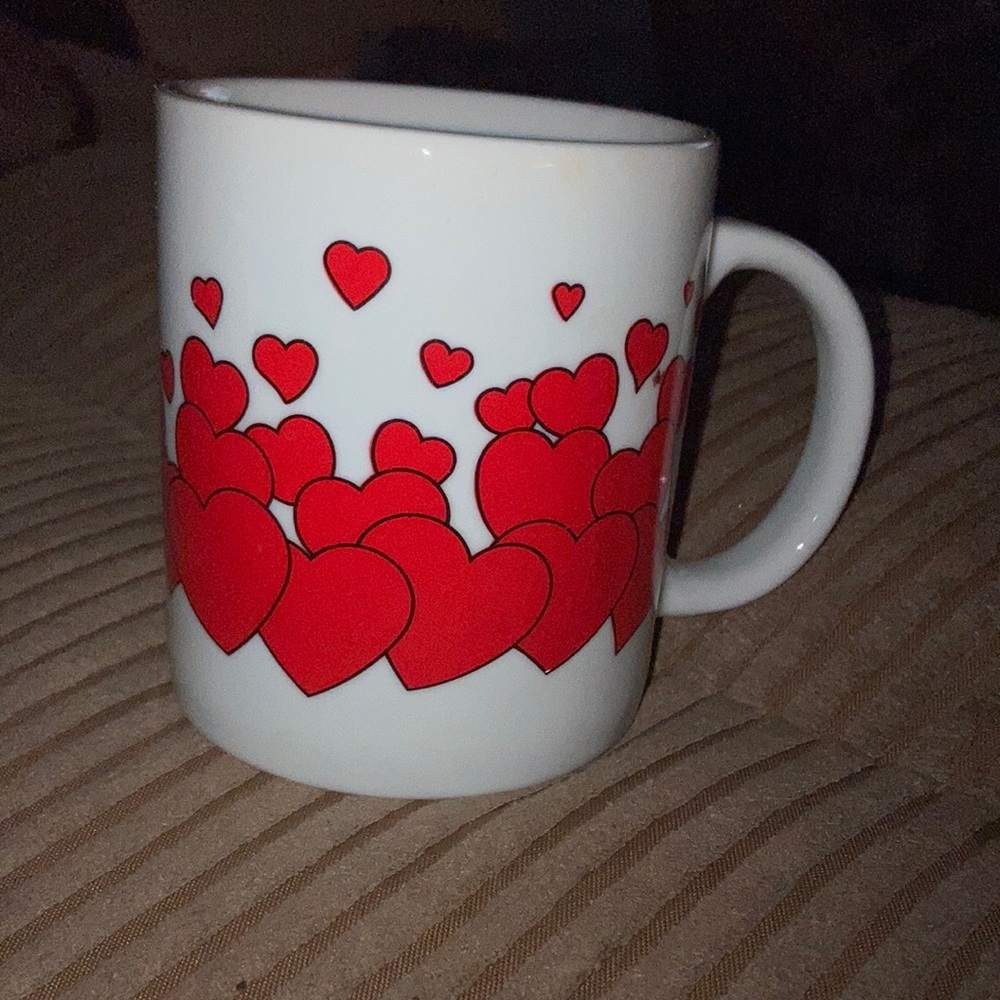 Coffee cup with flowing love hearts